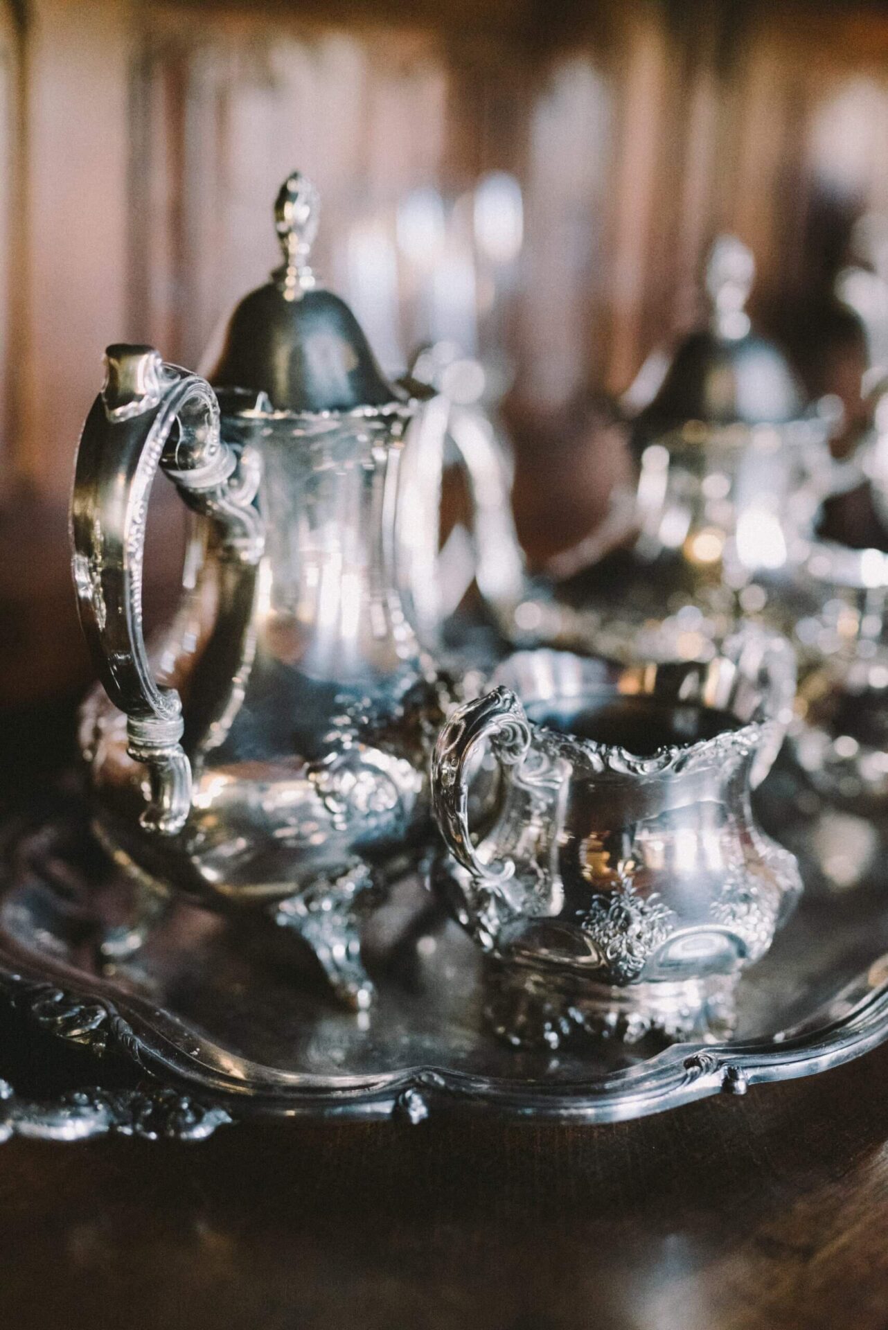 Official valuation inventory of family heirloom silver sets compiled by a Chicago probate appraiser.